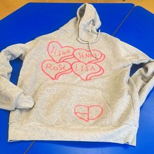 Black pink hoodie in gray with their girls names on it.